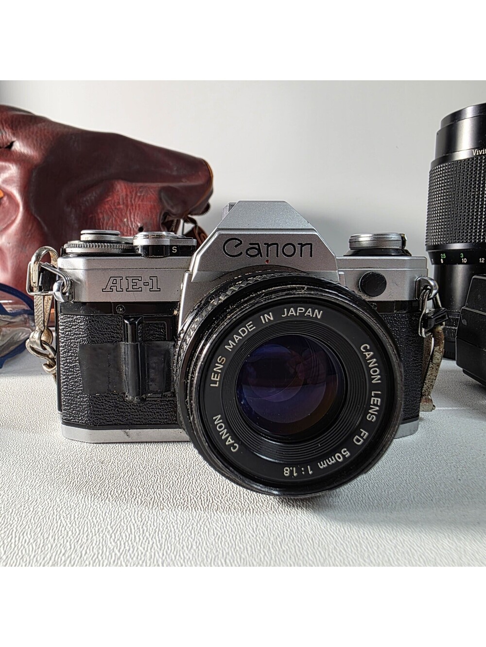 Canon AE‑1 35mm Film Camera Bundle – FD 50mm, 80–200mm Vivitar, 177A Flash Read